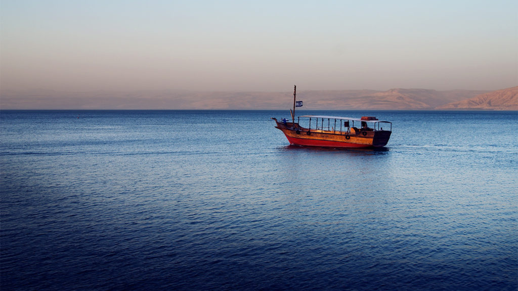 Royalty-free stock photo: A fishing boat on the Sea of Galilee